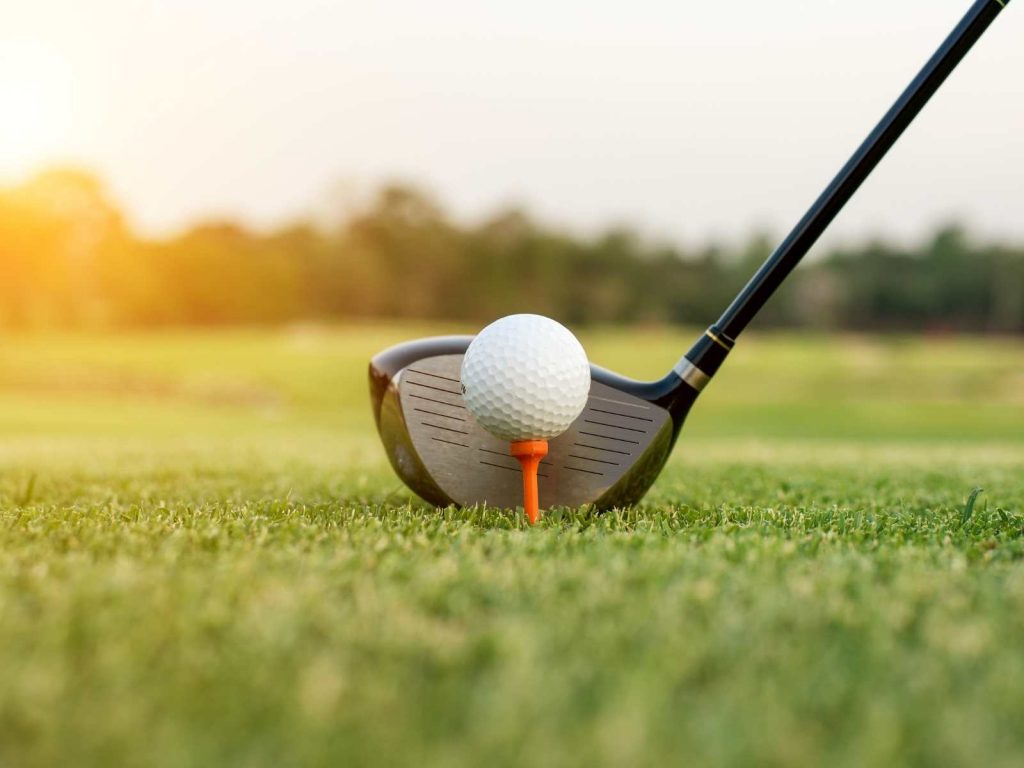 golf tee and ball