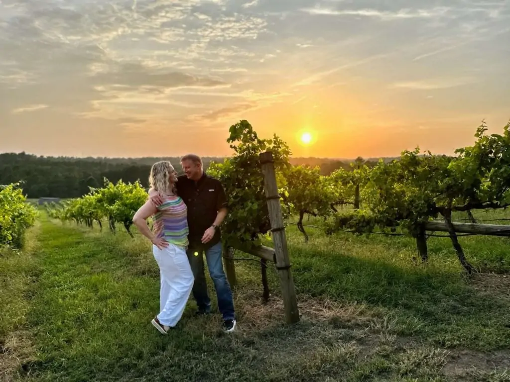 Marty and Michelle in the vineyards at Enoch's Stomp